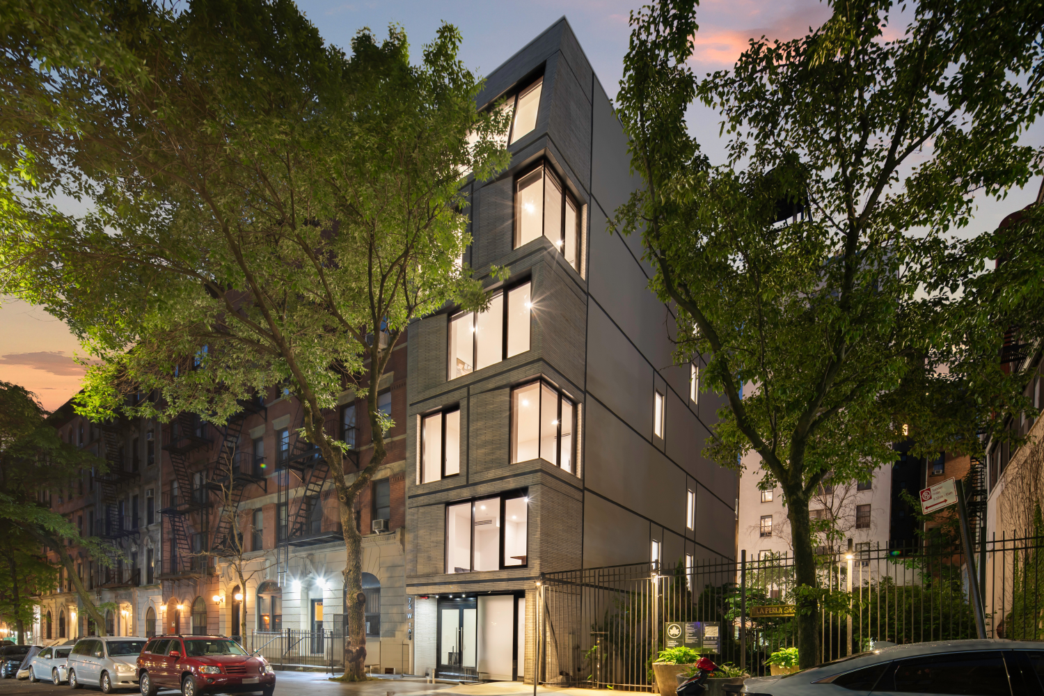 a view of a building with a tree