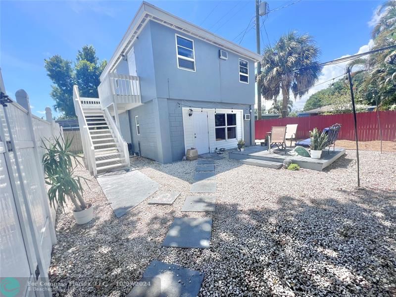 a house with yard in front of it