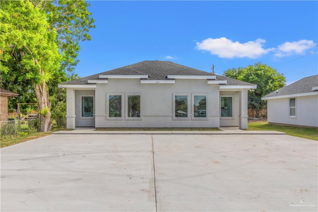 front view of house with a yard