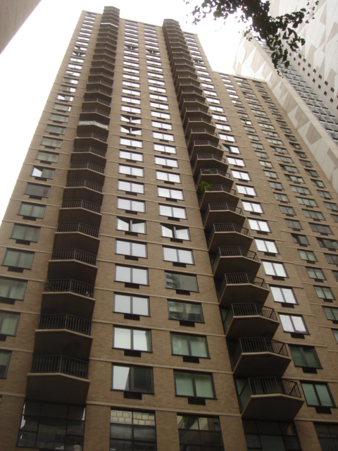 a view of a city with tall buildings