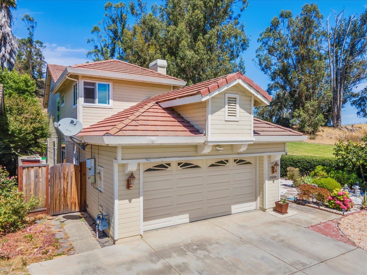 a front view of a house with a garage