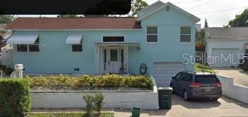 a front view of a house with yard