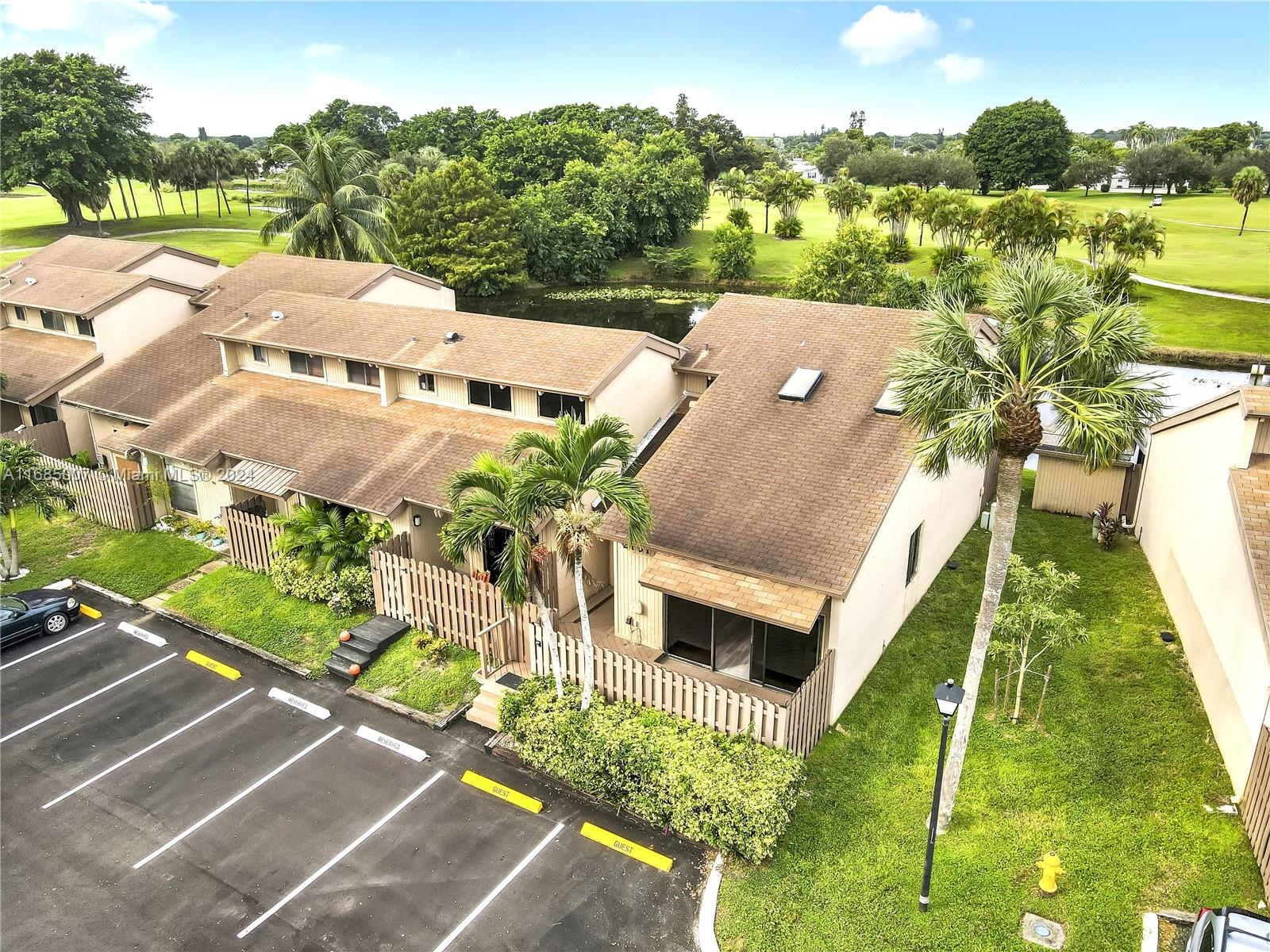 a aerial view of a house with a yard