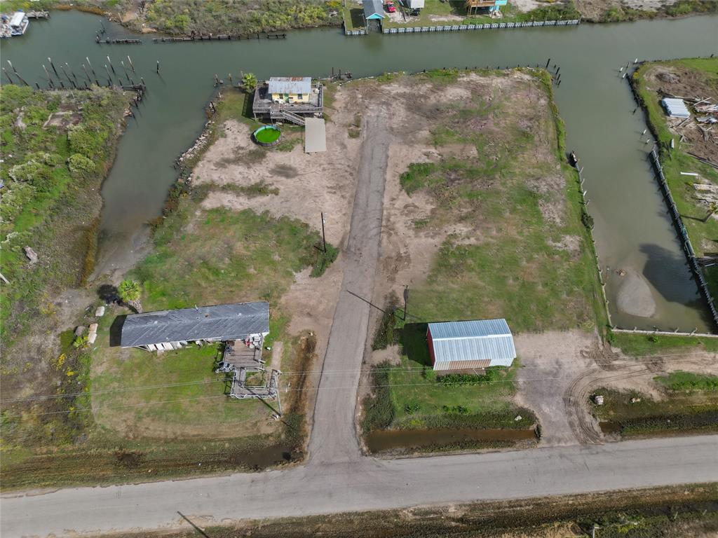 an aerial view of a house with a lake view