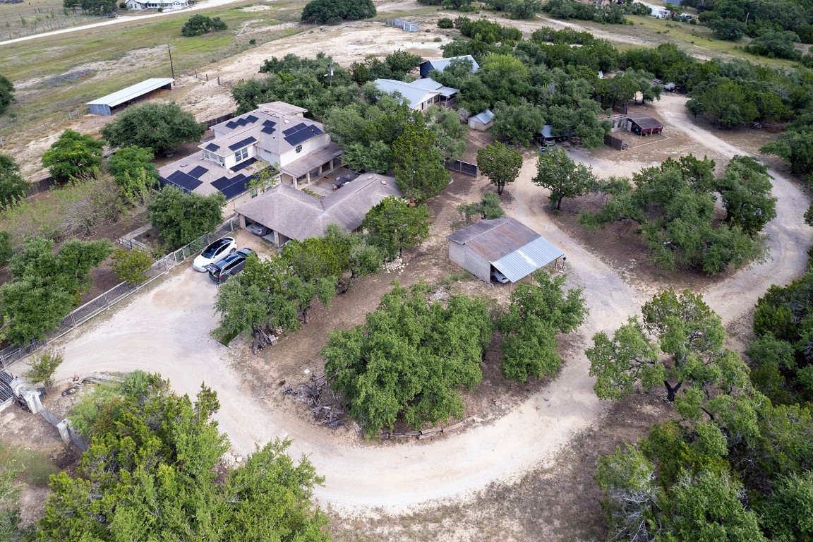 an aerial view of residential house with outdoor space