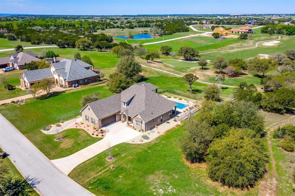 an aerial view of a house with a garden