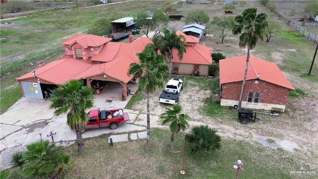 an aerial view of a house with a garden