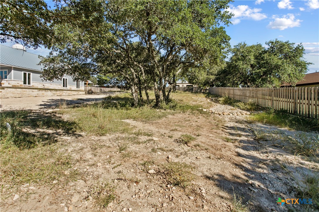 a view of swimming pool with a yard