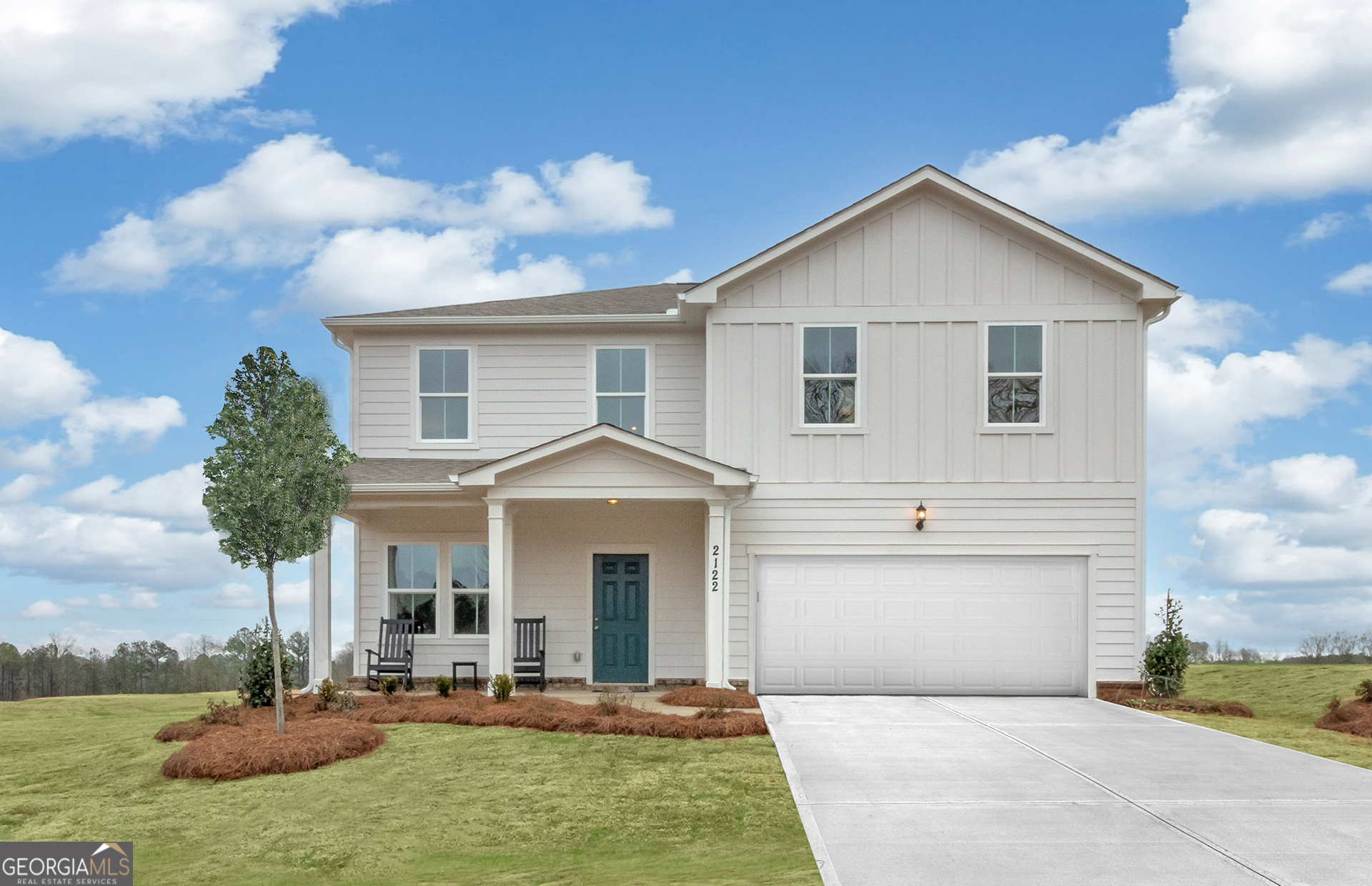 a front view of house with yard and green space