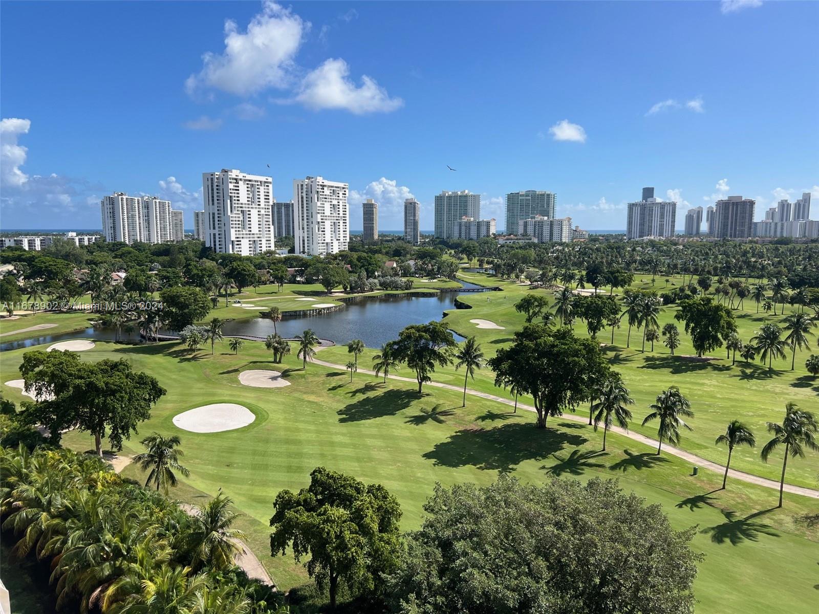 a view of a city with tall buildings