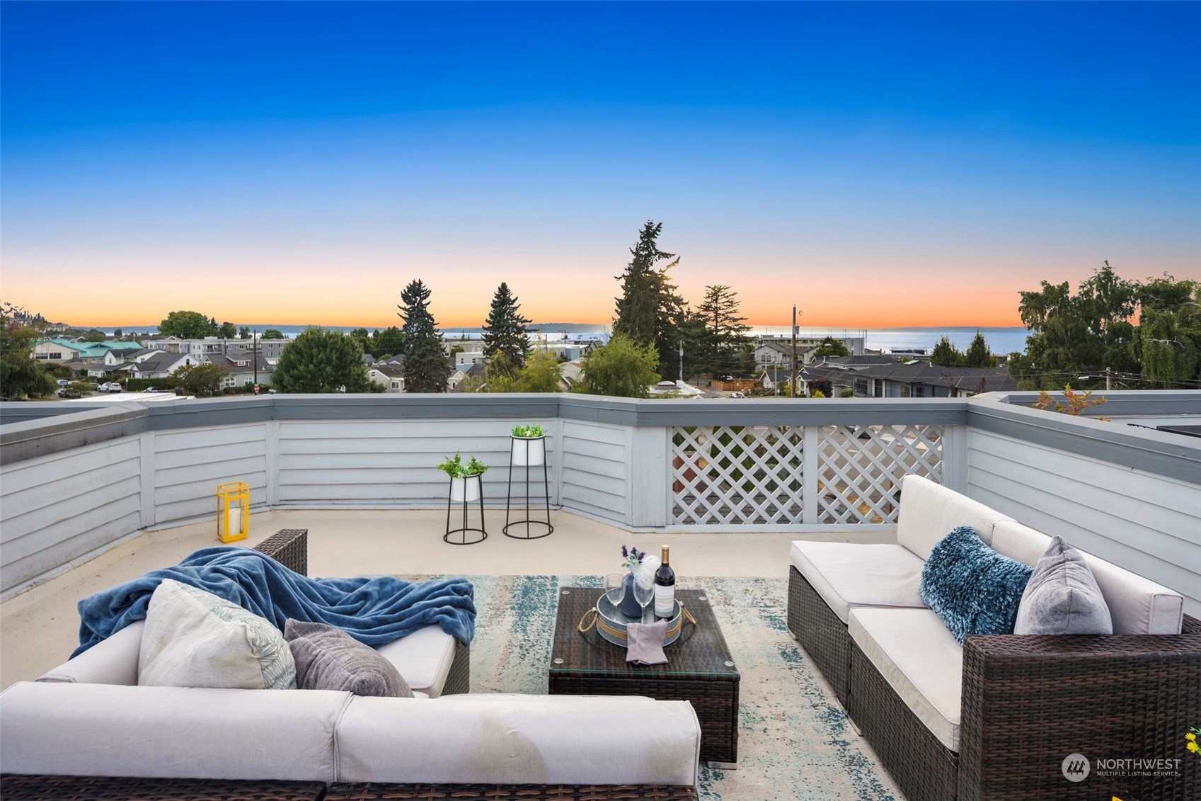 a outdoor living space with furniture and city view