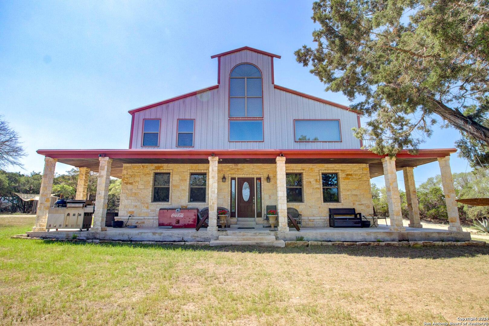 front view of a house with a swimming pool