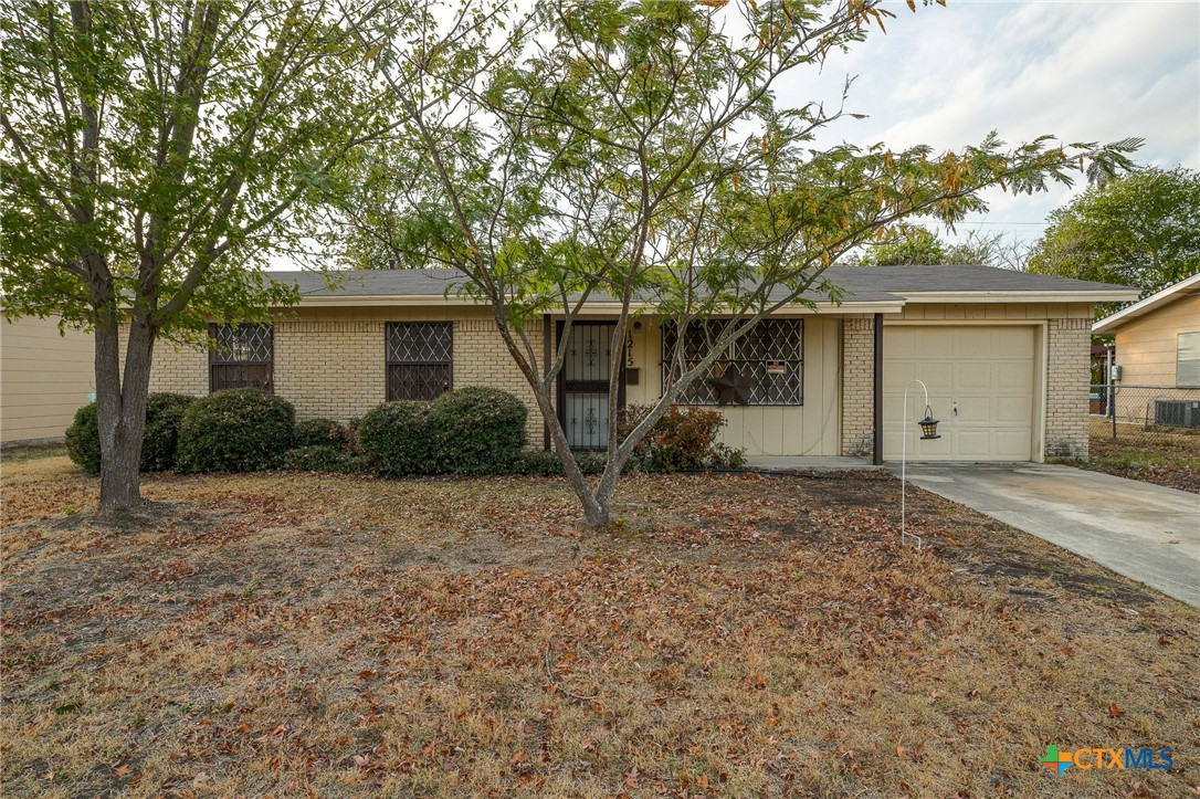 a house with trees in the background