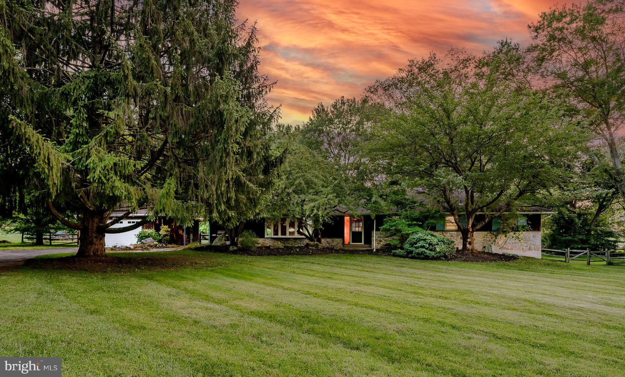 Malvern Estate with Landscaping Touches by Longwood Gardens