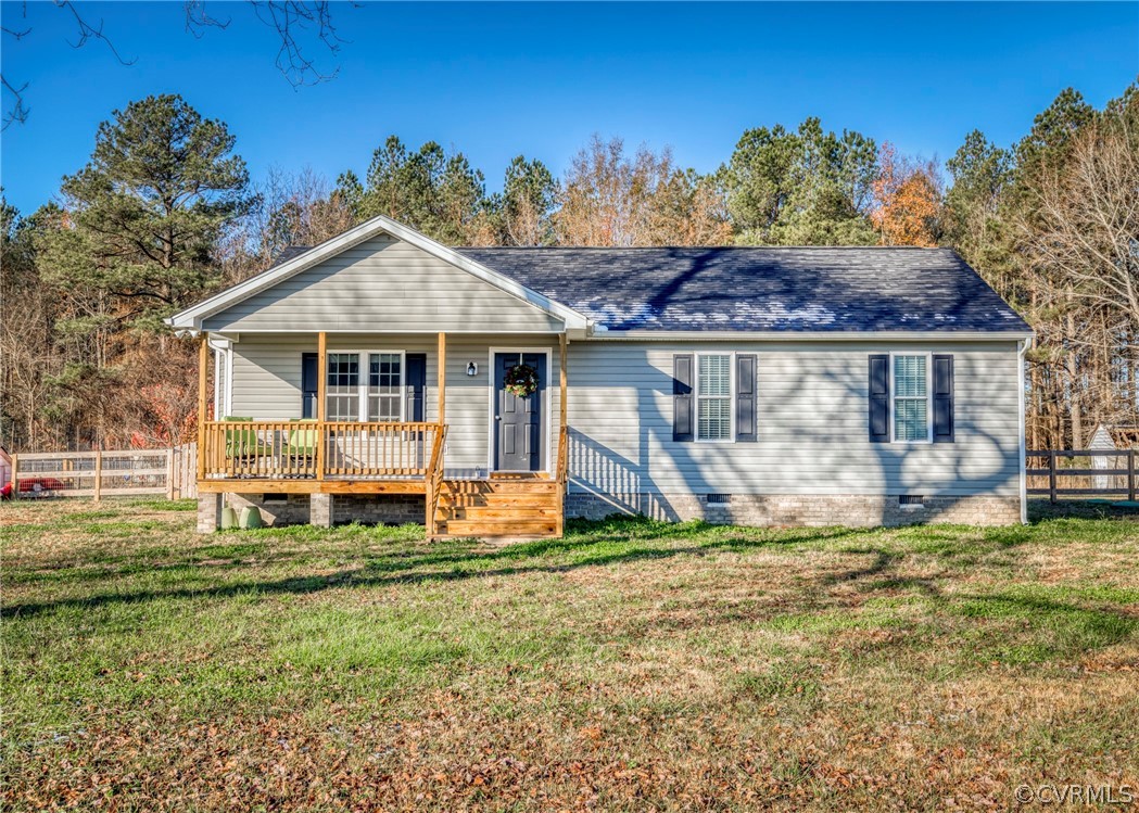 a house with trees in the background