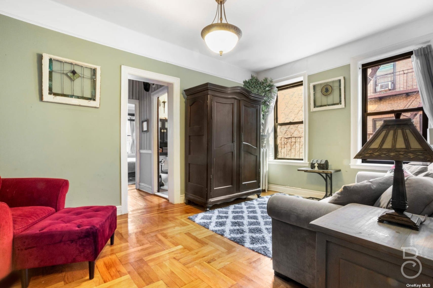 a living room with furniture and a window