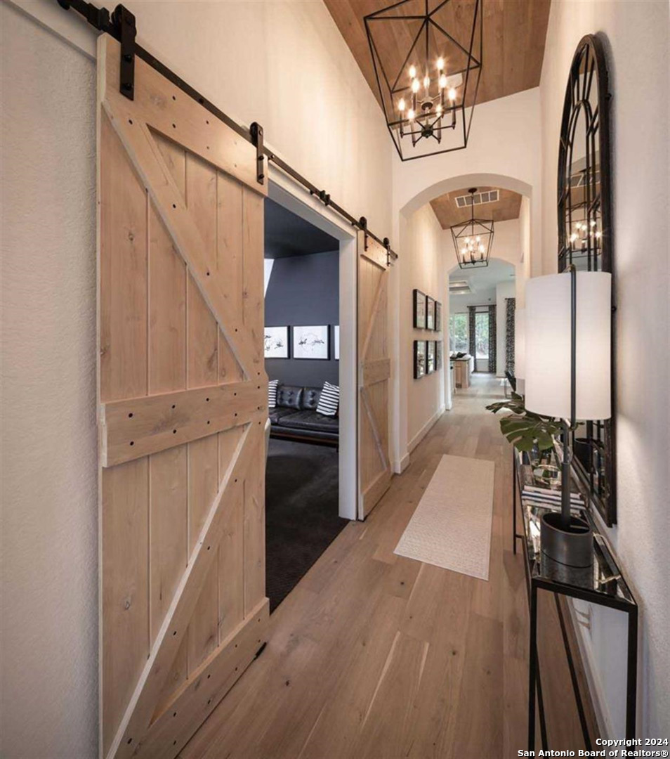 a view of a kitchen from the hallway