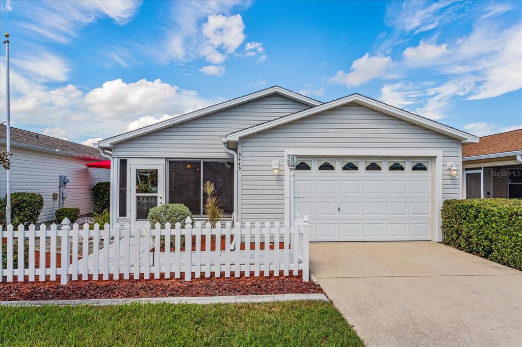 front view of a house with a small yard