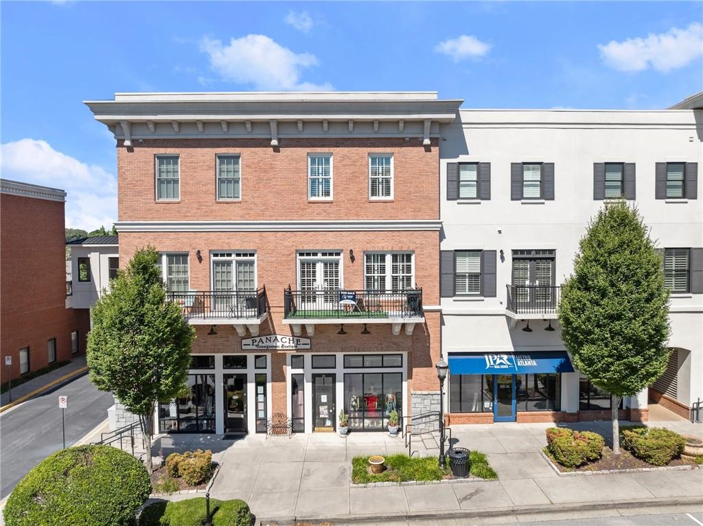 a front view of a building with street view