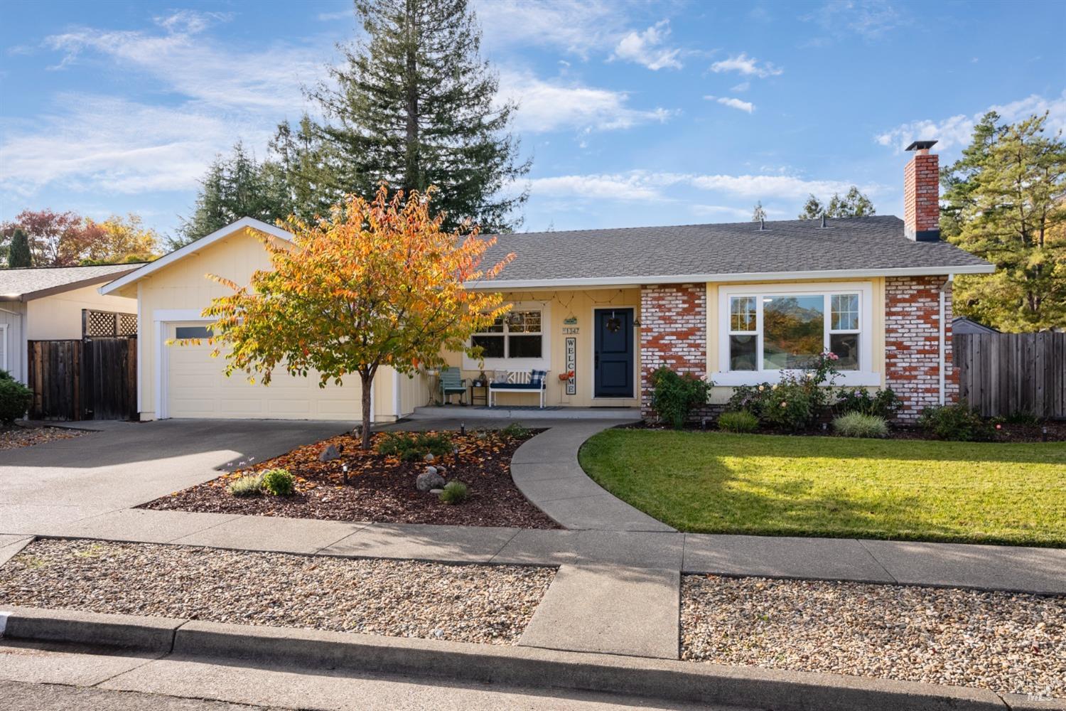 front view of a house with a yard