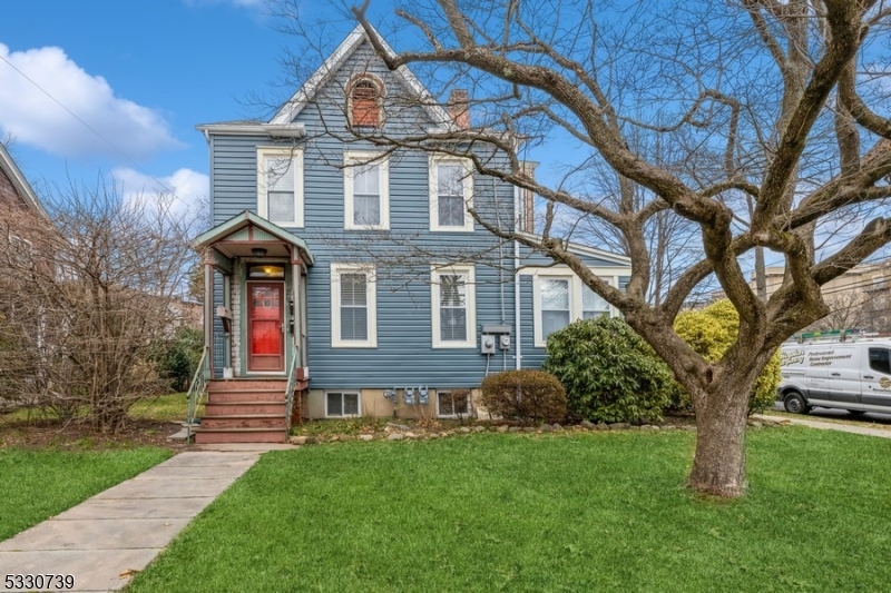 front view of house with a yard