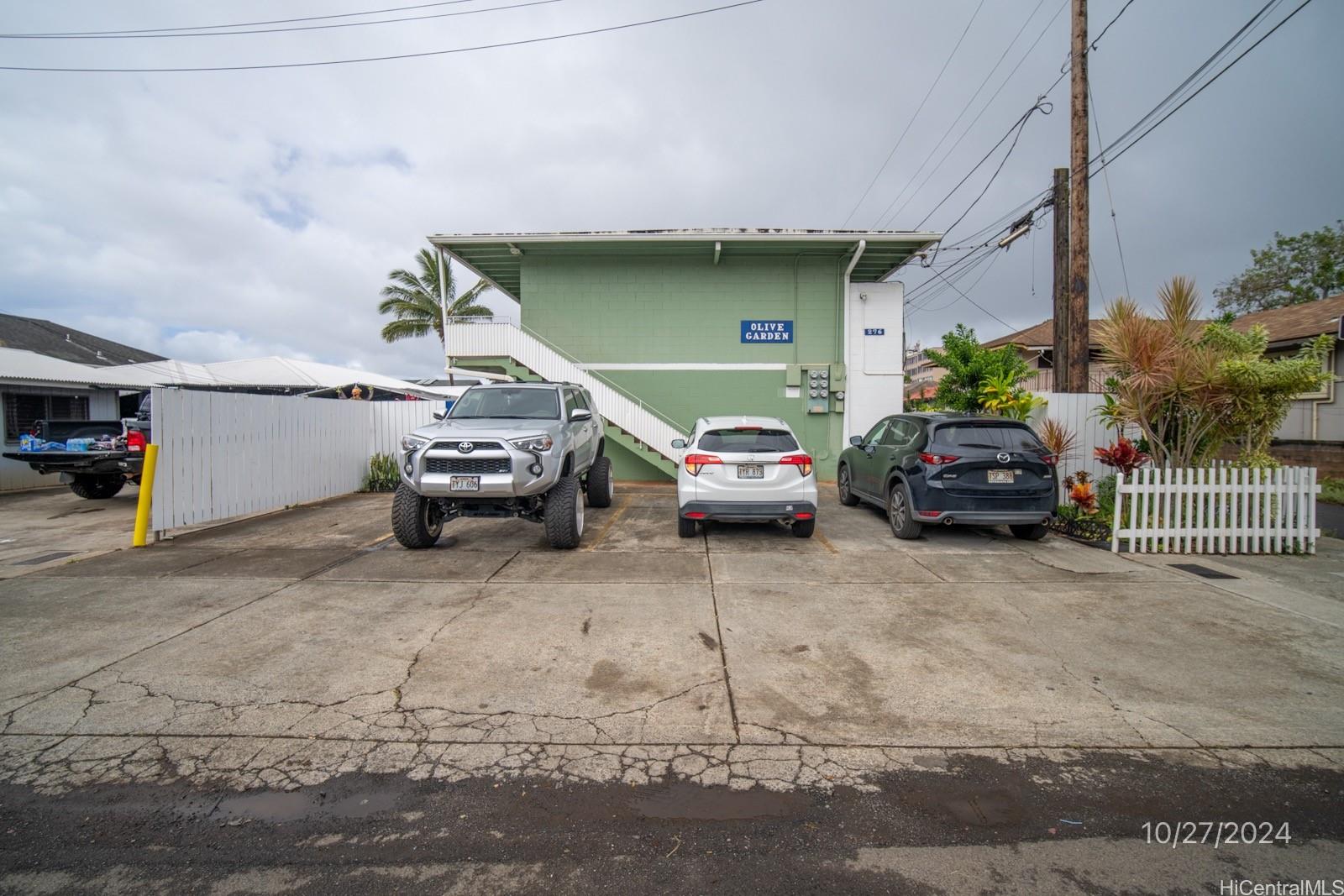 a car parked in parking area of a house