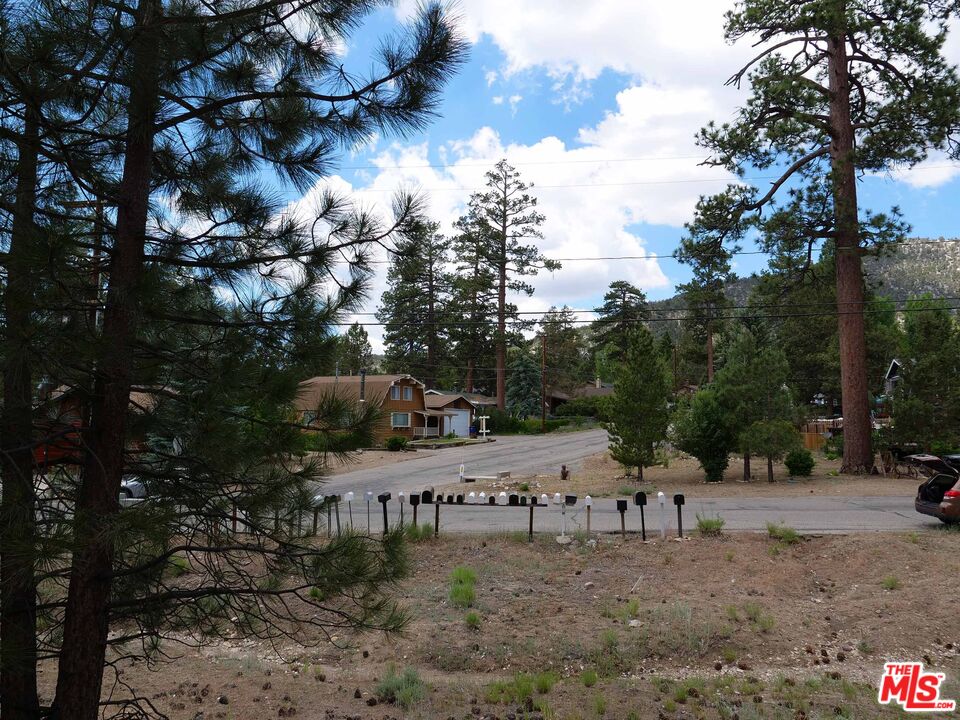 a view of a town with trees