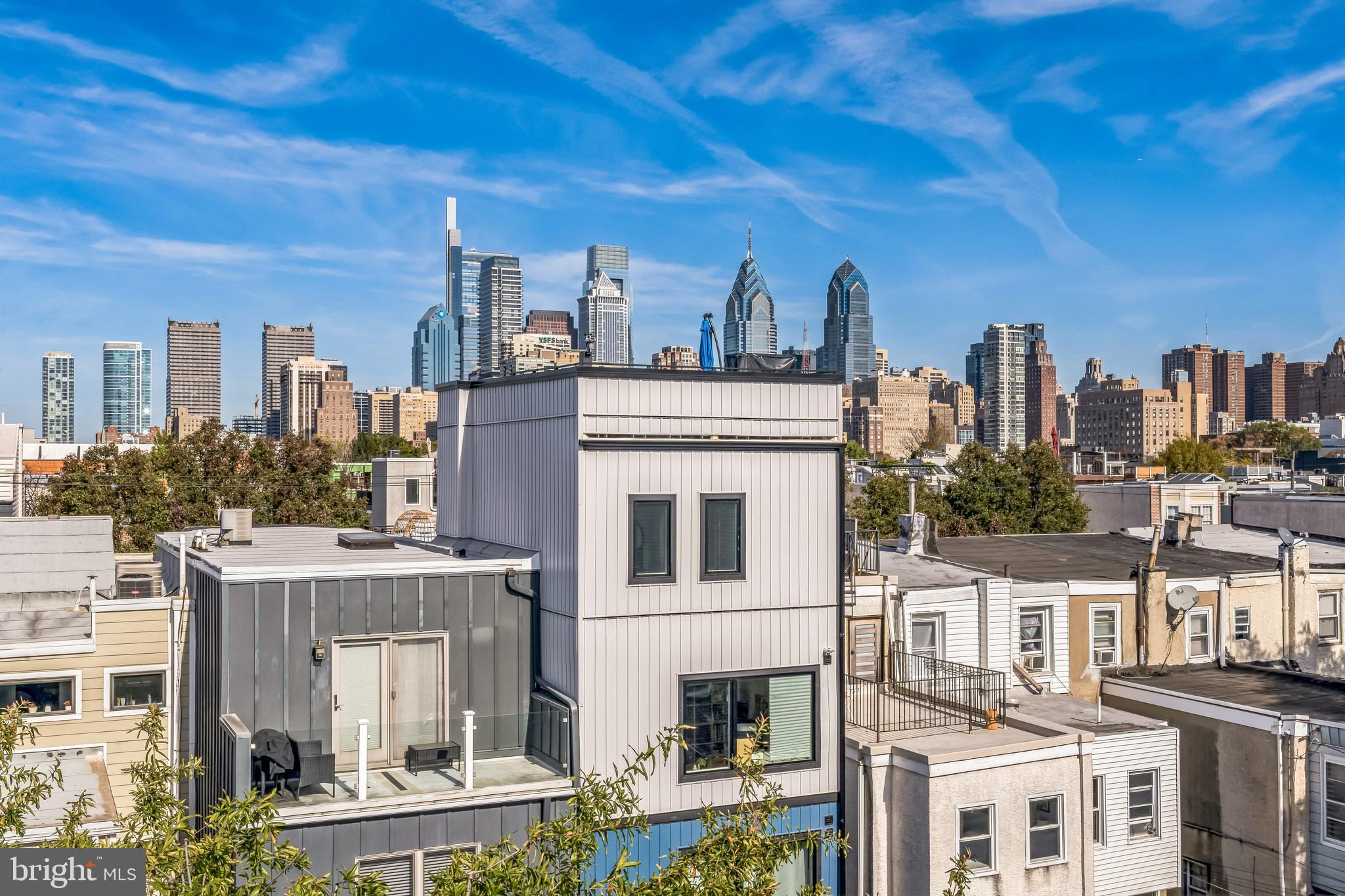 a view of a city with tall buildings