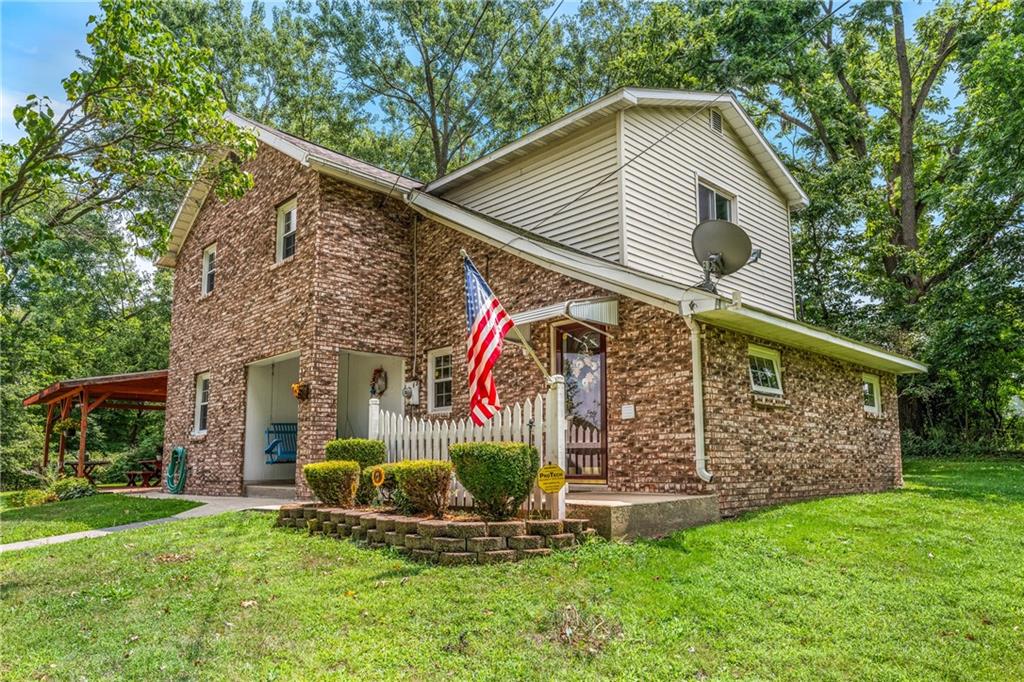 front view of house with a yard