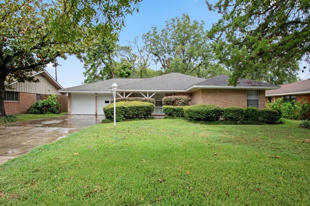 front view of a house and a yard