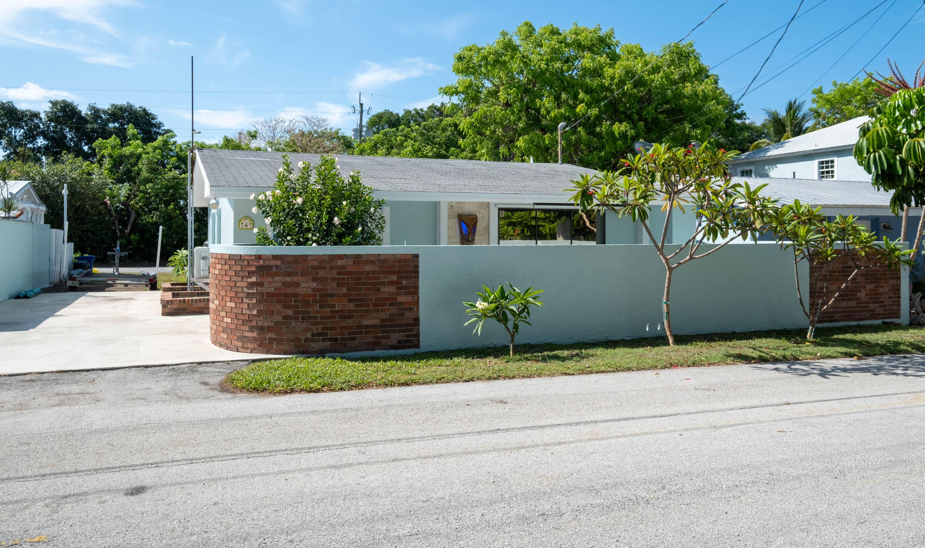 front view of a house and a yard