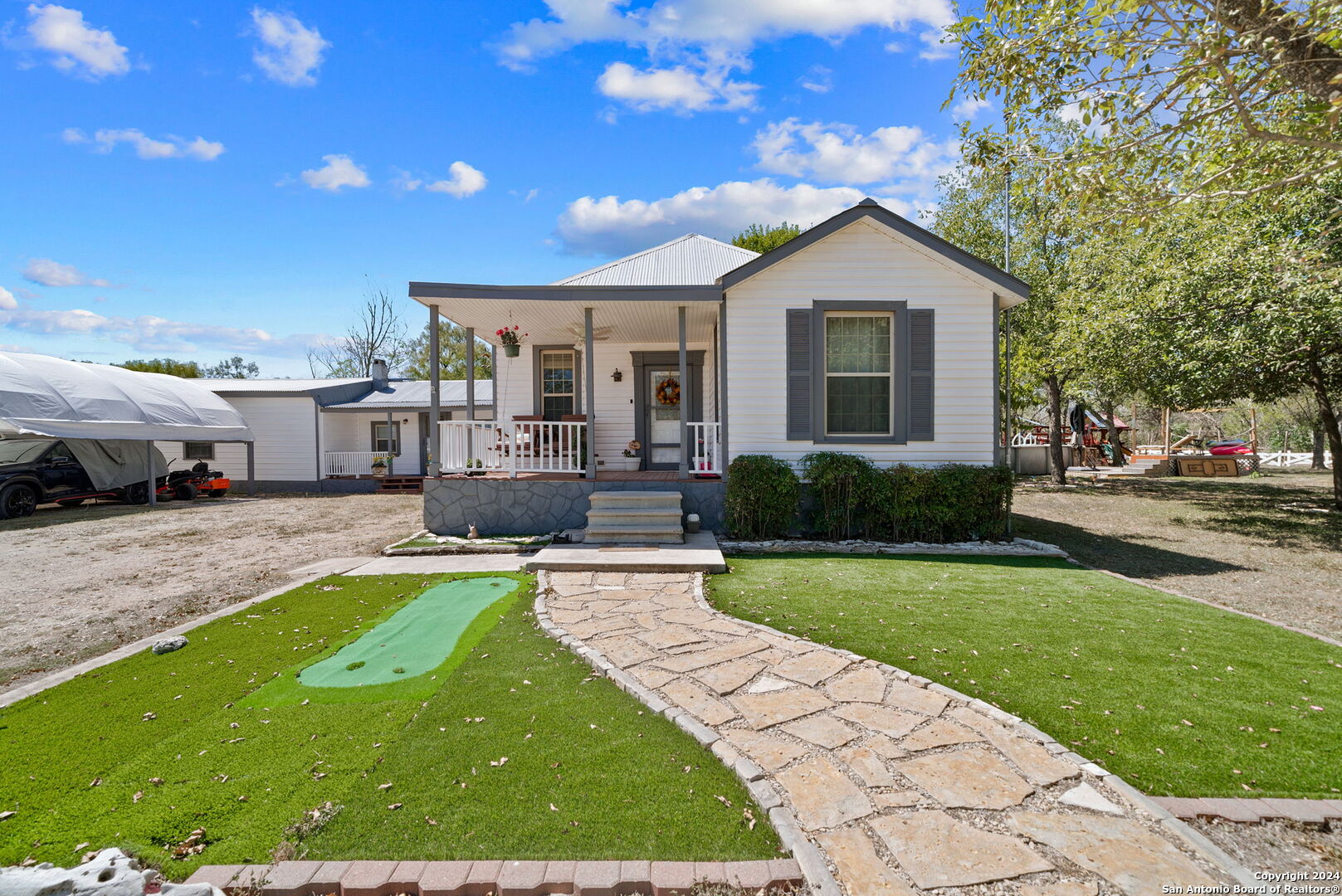 a view of a house with a patio