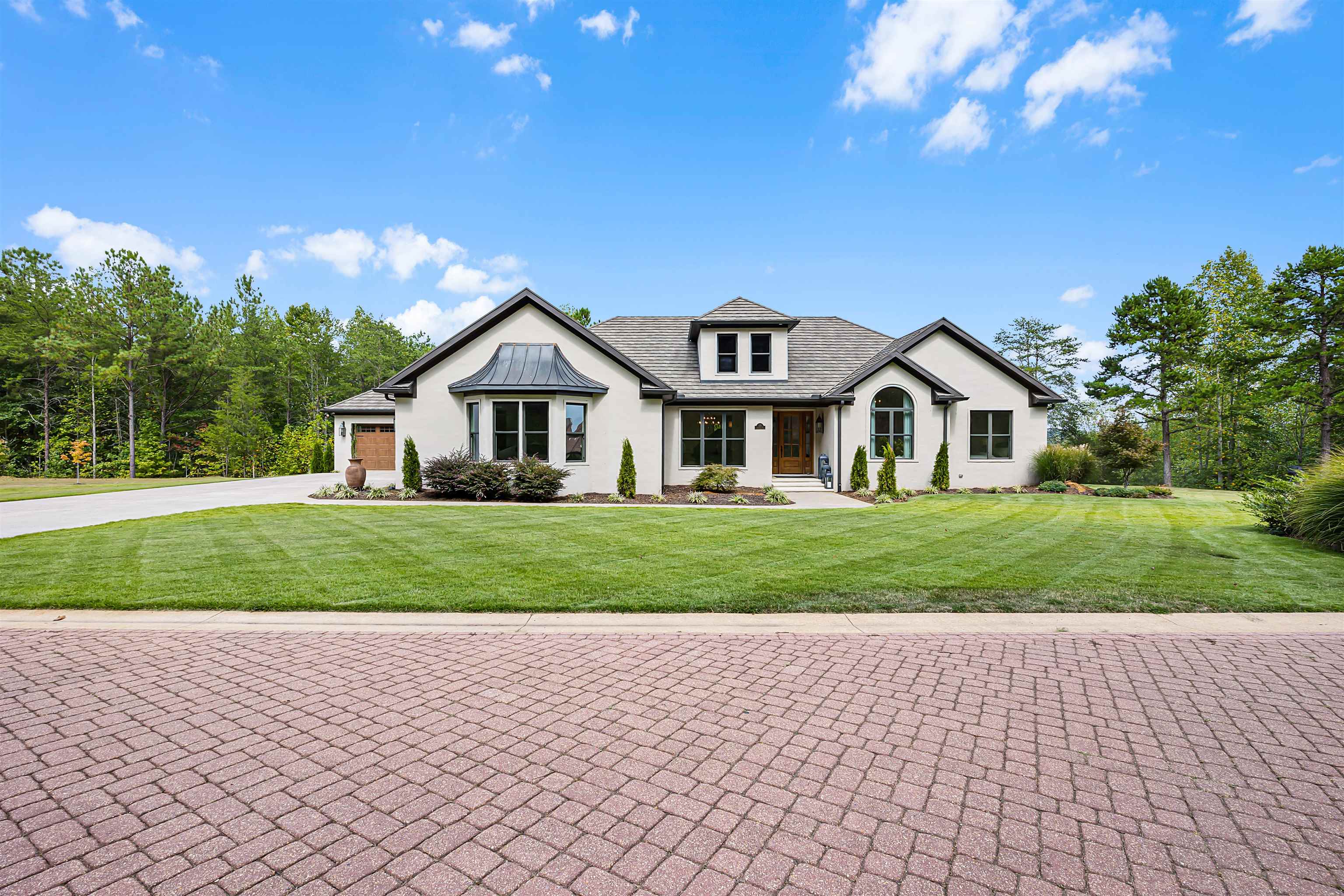 View of front of house with a front yard