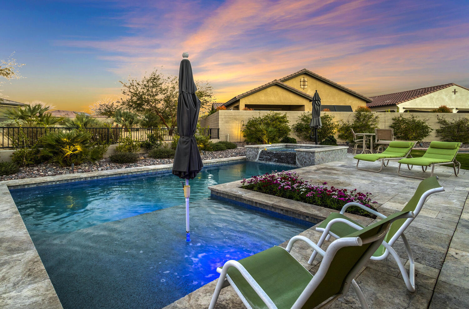 a view of swimming pool from a balcony