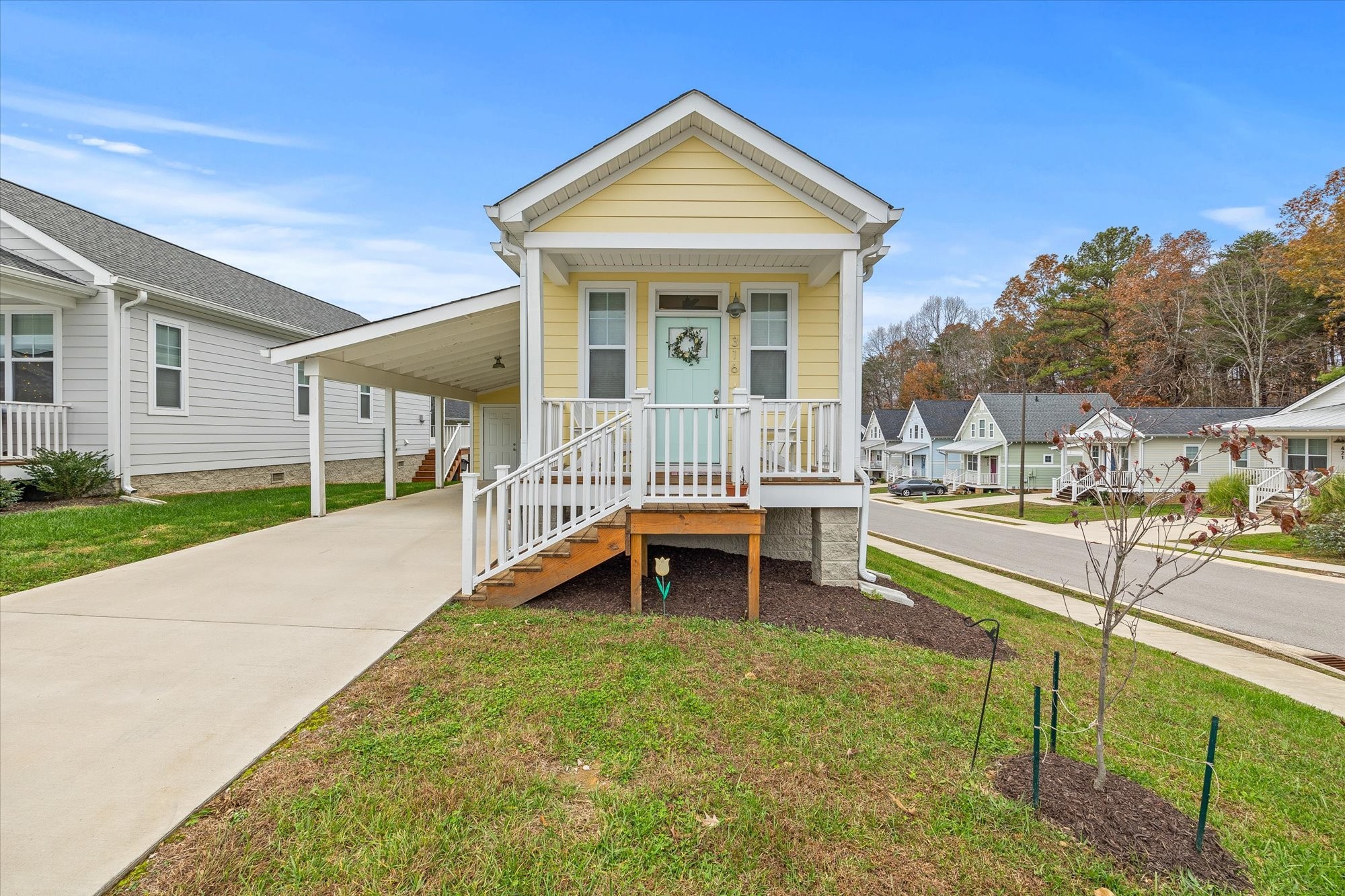 a view of a house with swimming pool and porch