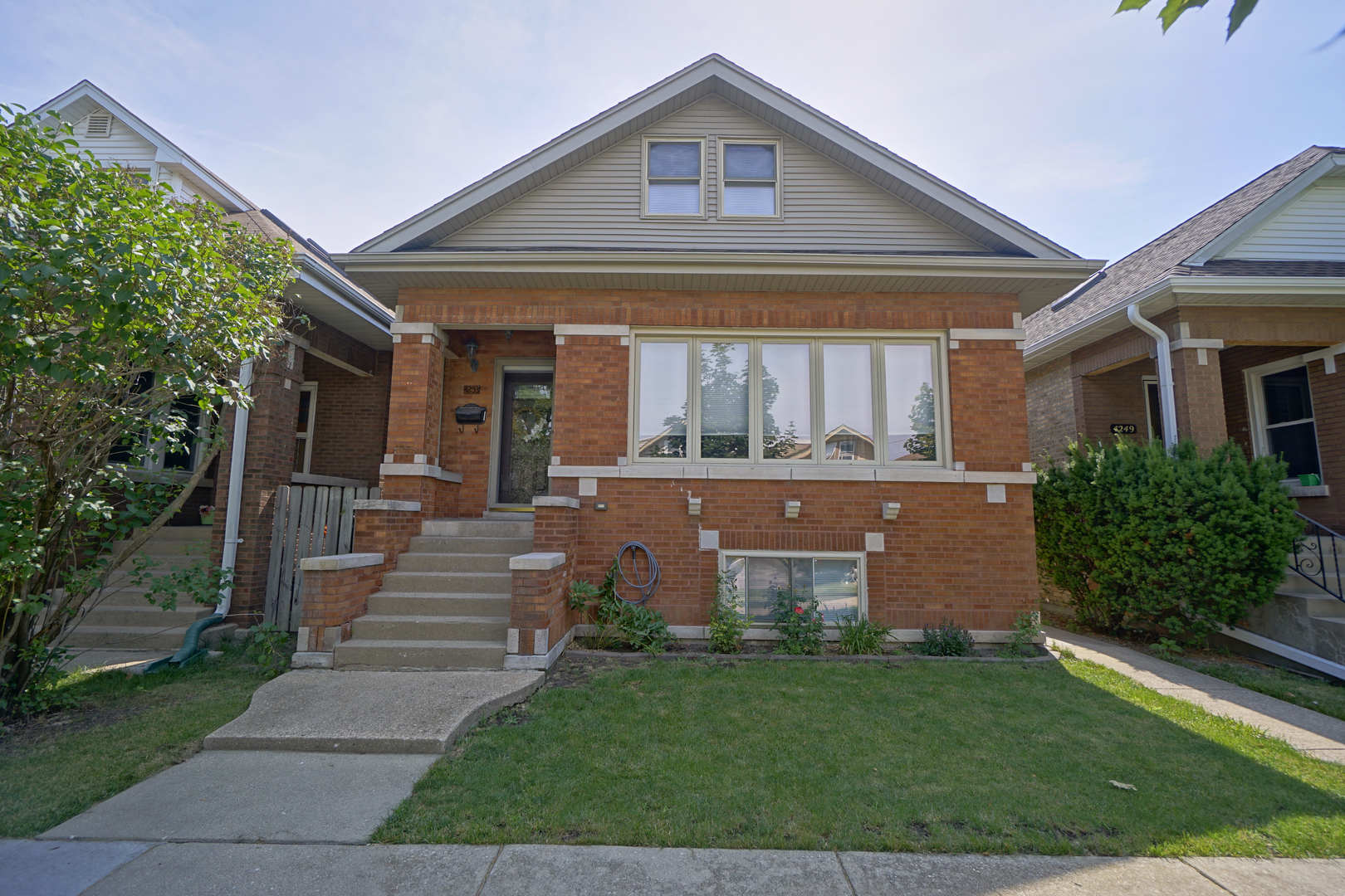 front view of house with a yard