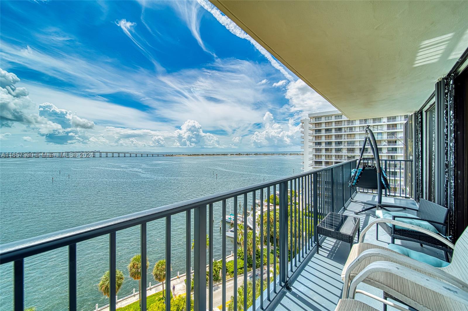 a view of balcony with furniture