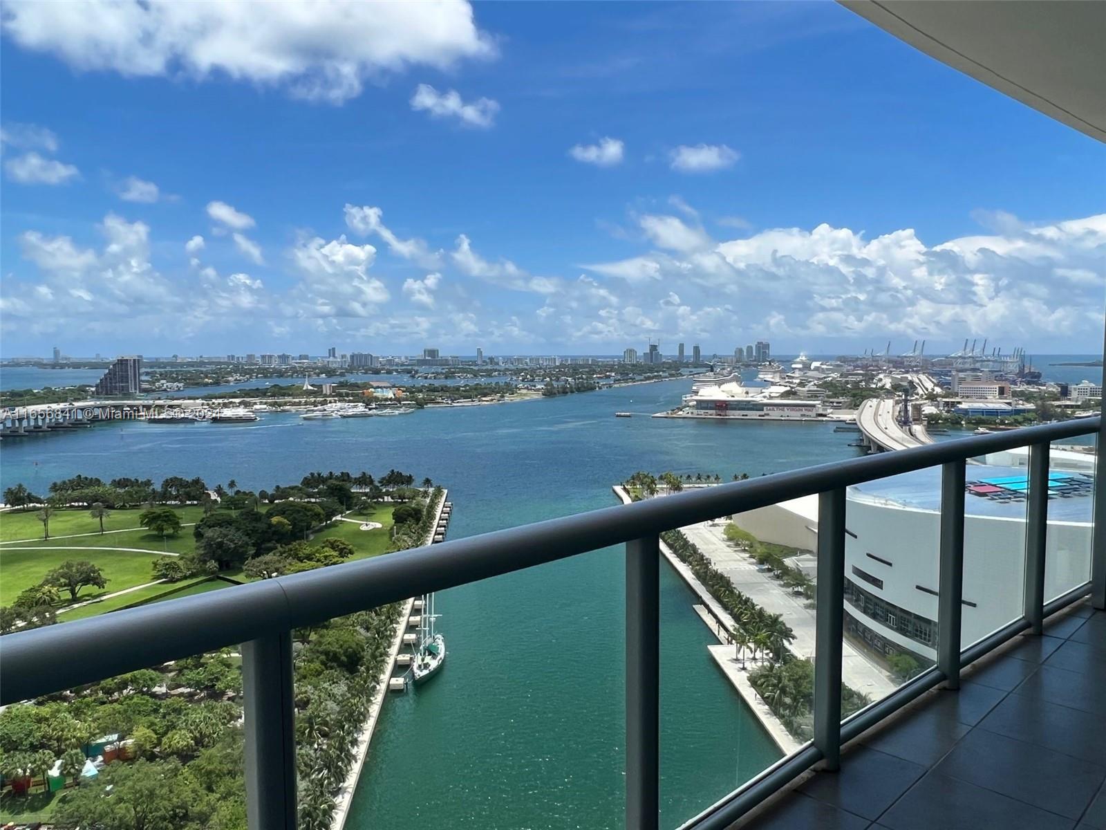 a view of a balcony next to a lake view