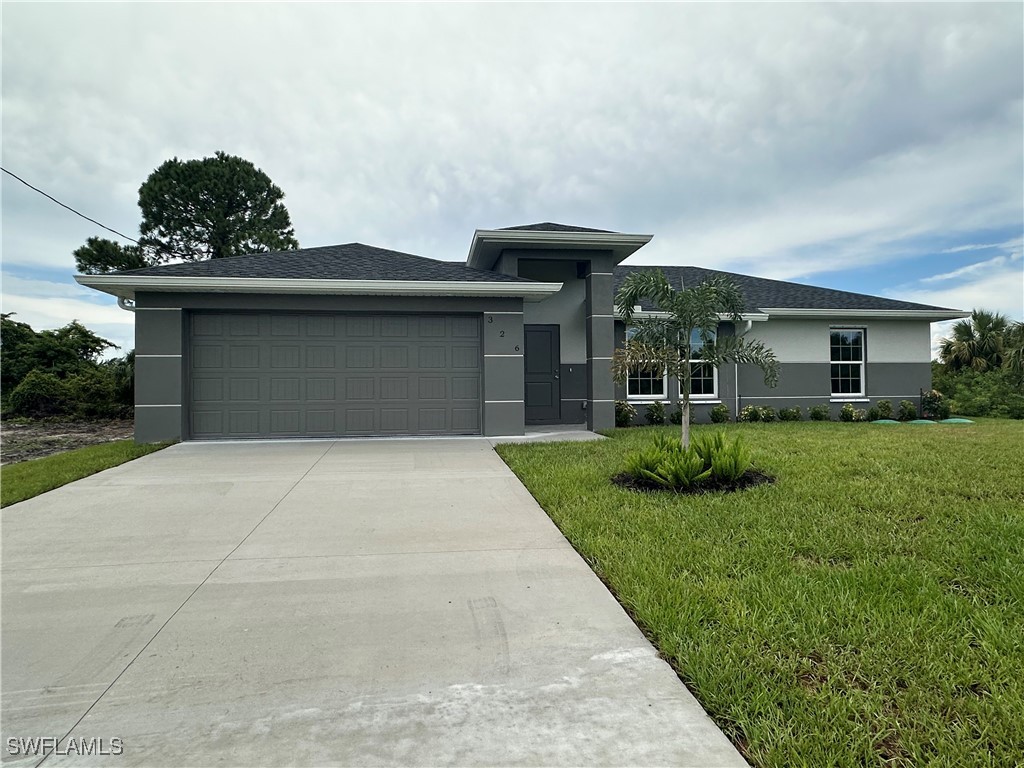 a front view of house with yard