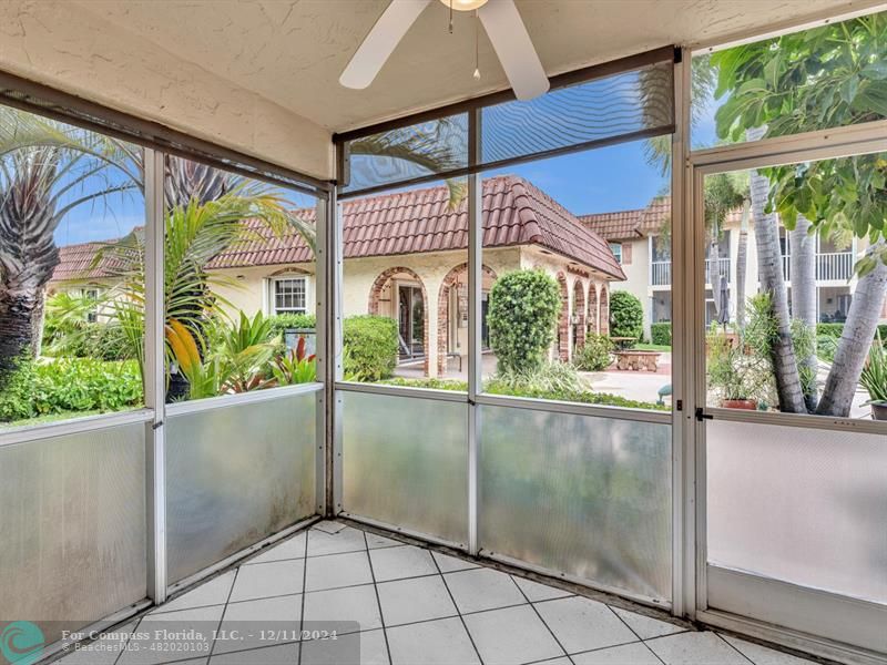 a view of a glass door with a outdoor space