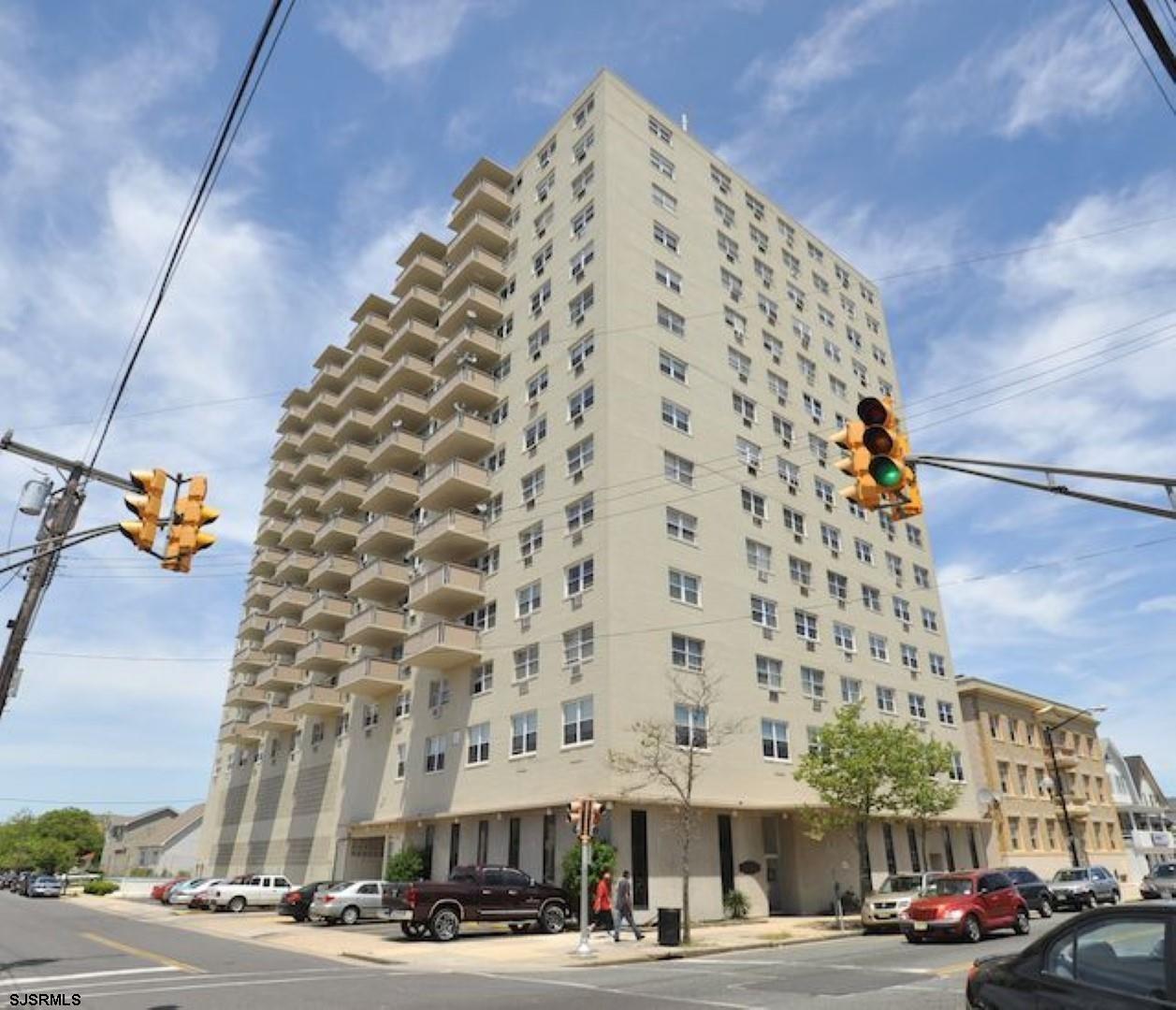 a front view of a building with street view