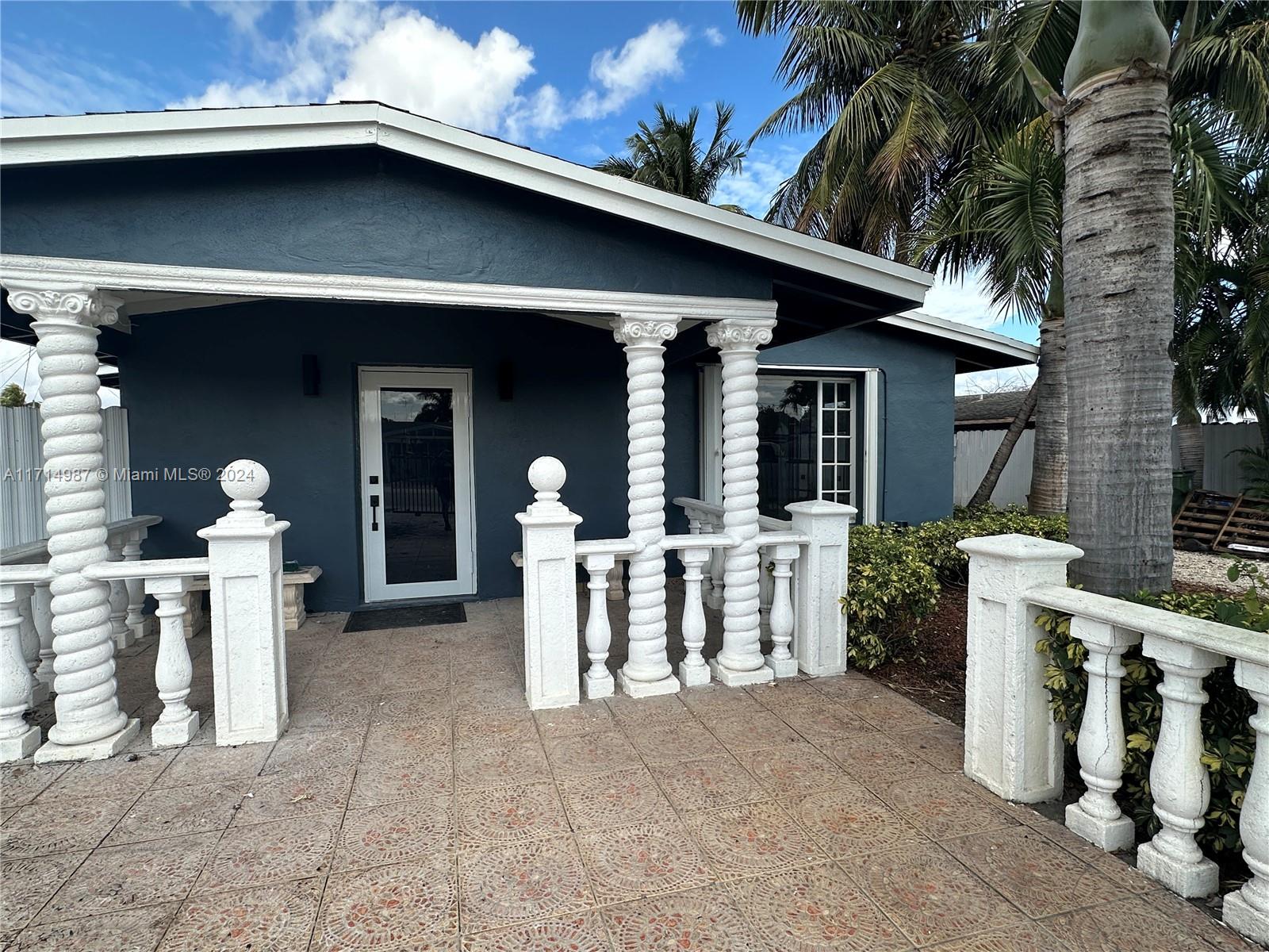 a view of a house with patio