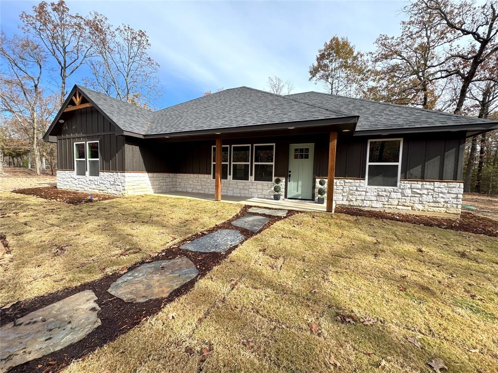 a front view of a house with a patio