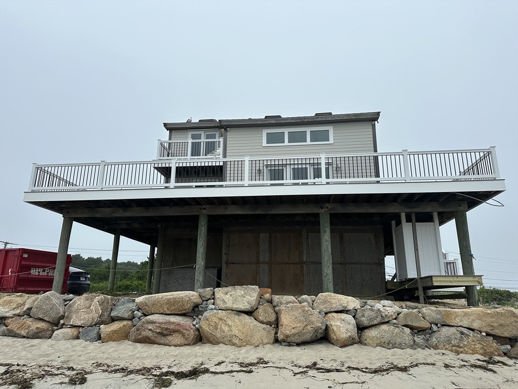 a front view of a house with a porch