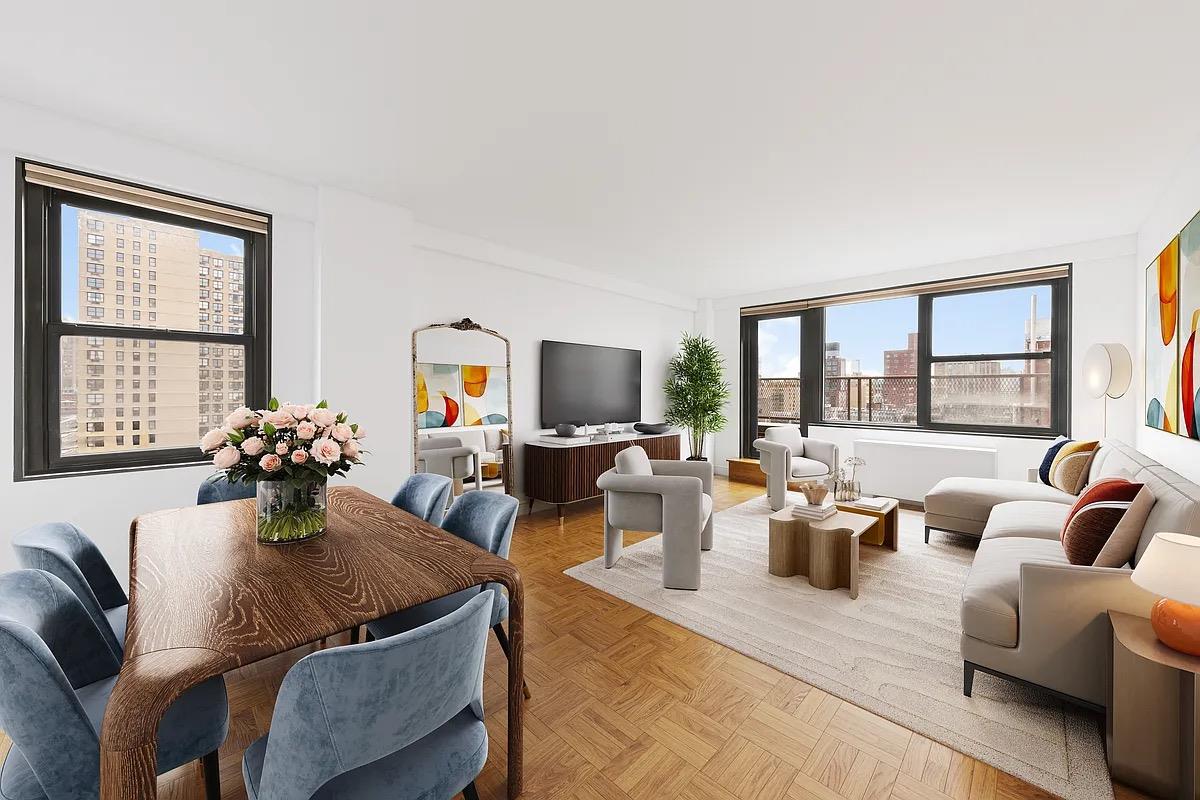 a living room with furniture large window and flat screen tv