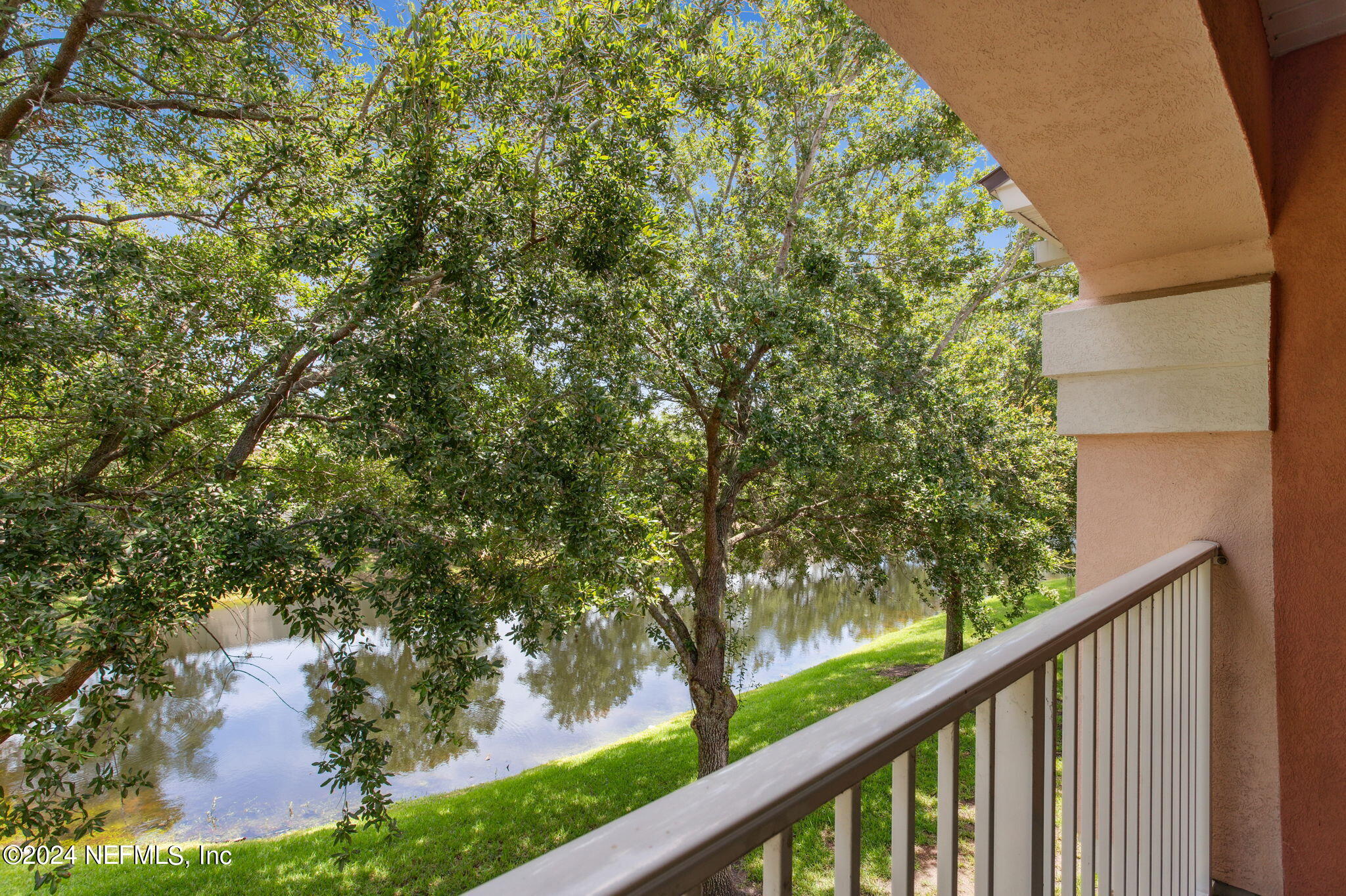 a balcony with tree