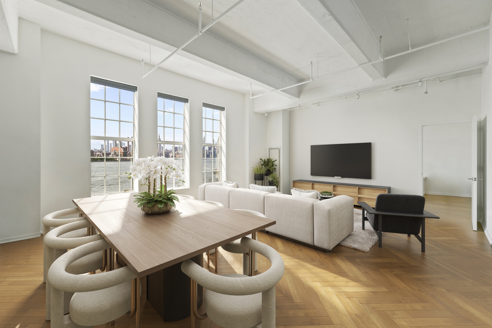 a living room with furniture a flat screen tv and a large window