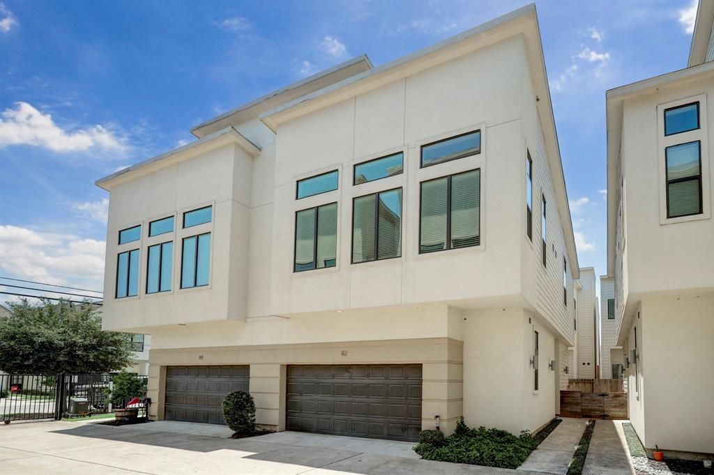 a front view of a house with garage