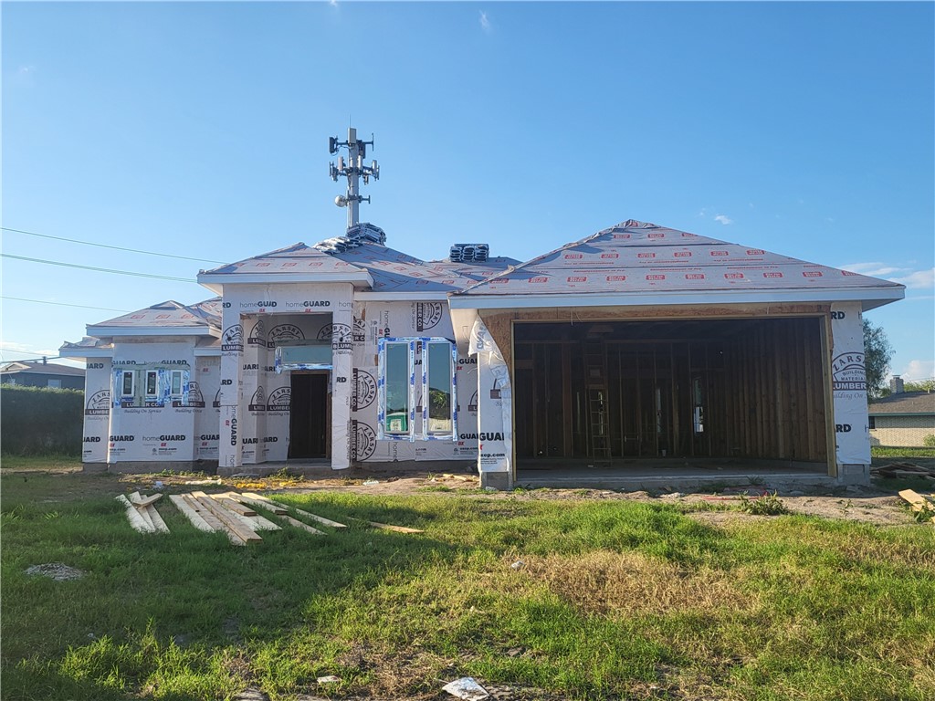 a view of a house with a garden