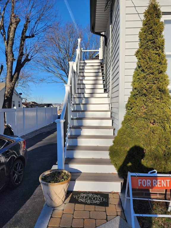 a view of stairs and patio